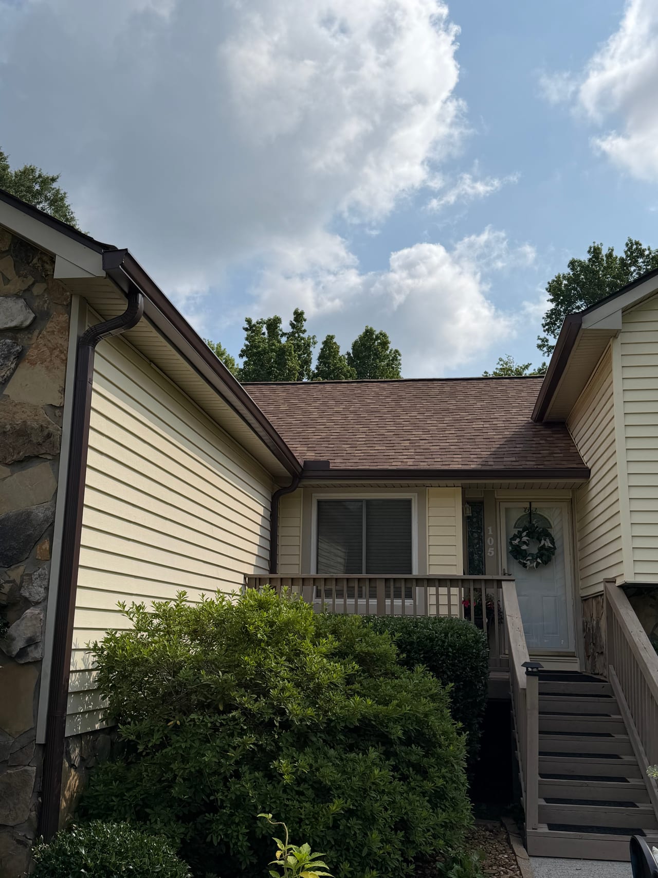 Close-up of seamless gutters and trim on a home installed by Exotic Exteriors